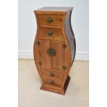 A modern Chinese rosewood vase shaped cabinet with an arrangement of four drawers and two panelled