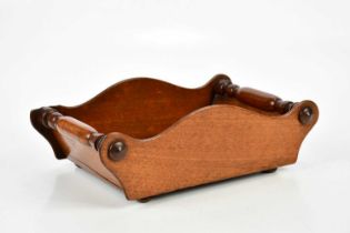 A Victorian mahogany cheese coaster with turned columns, length 33.5cm.