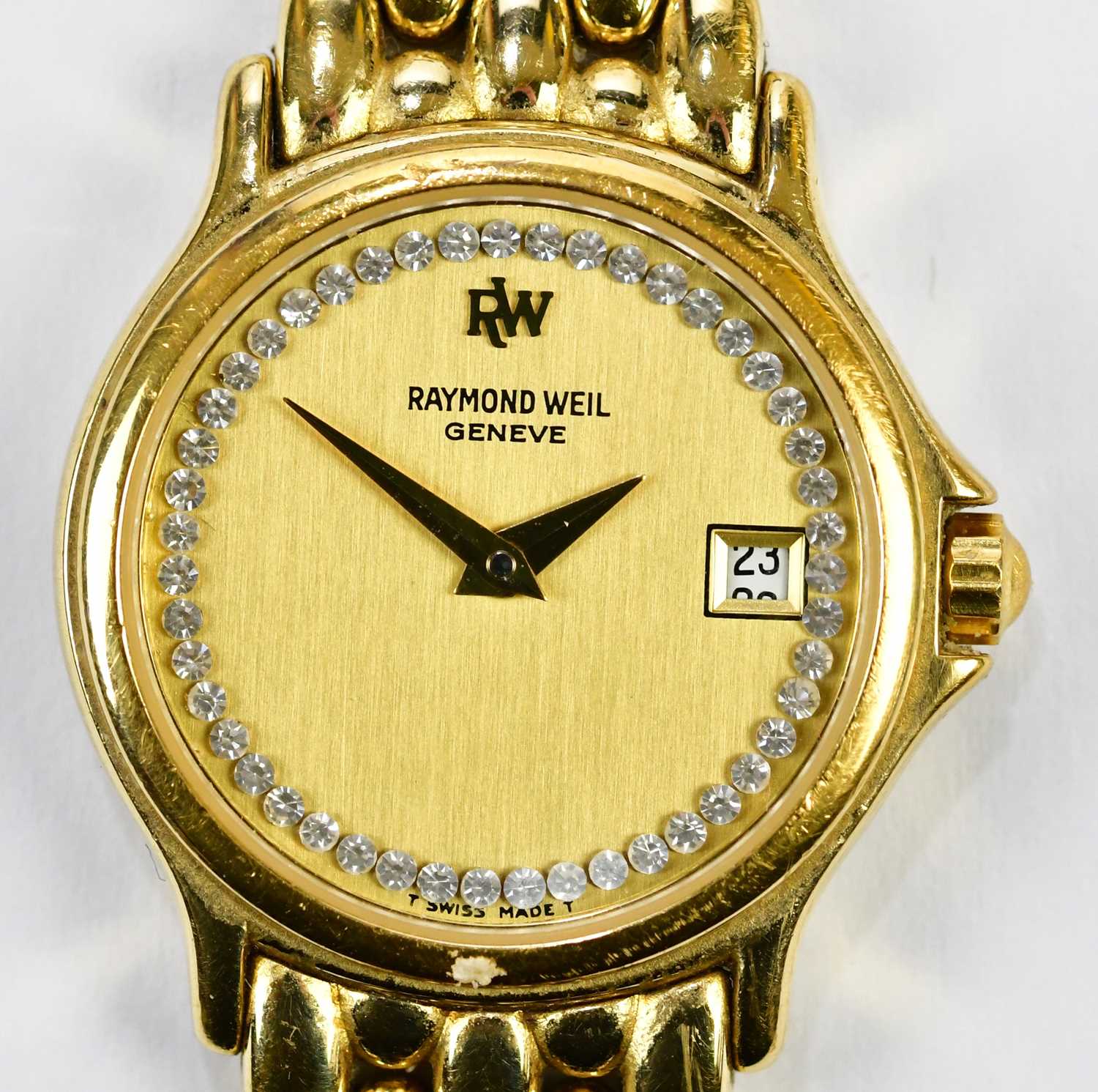 RAYMOND WEIL; a lady's gold plated wristwatch with circular dial set with date aperture with both