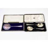JOHN SANDERSON & SON; a pair of George VI hallmarked silver rat tail serving spoons, stamped