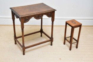 A 1920s carved oak side table on turned columns height 73cm, width 66cm, depth 45cm, and a painted