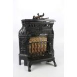 FLETCH & RUSSELL CO, WARRINGTON; a black painted cast iron miniature Riviera fire, 50 x 43cm.