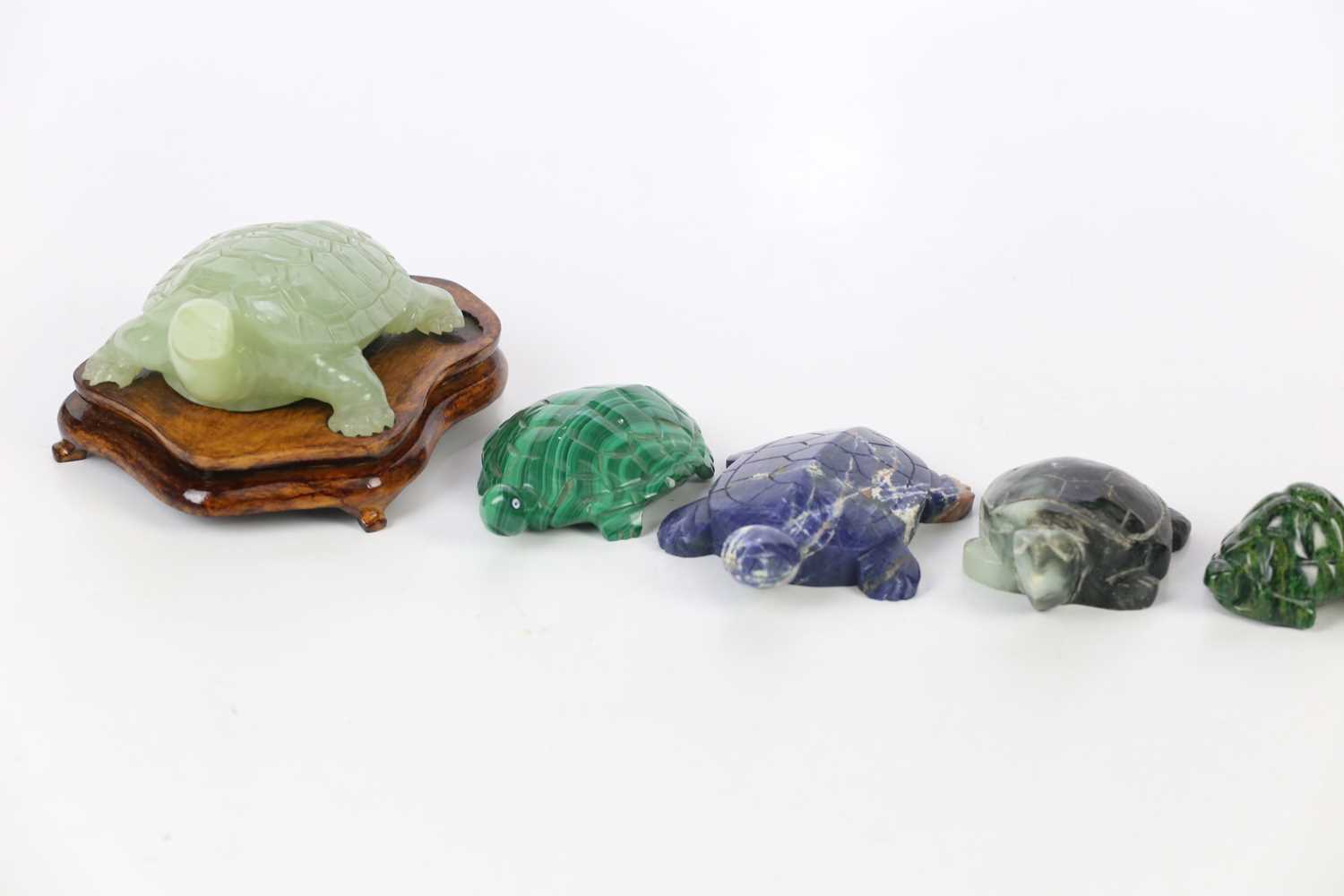 A collection of eight hardstone carved tortoises, including jade and malachite examples. - Image 2 of 4