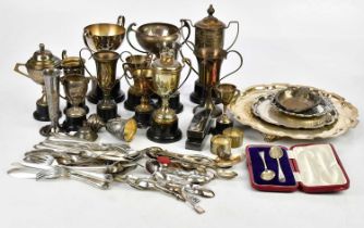 A collection of assorted silver plated items, including trophy cups, flatware, etc.