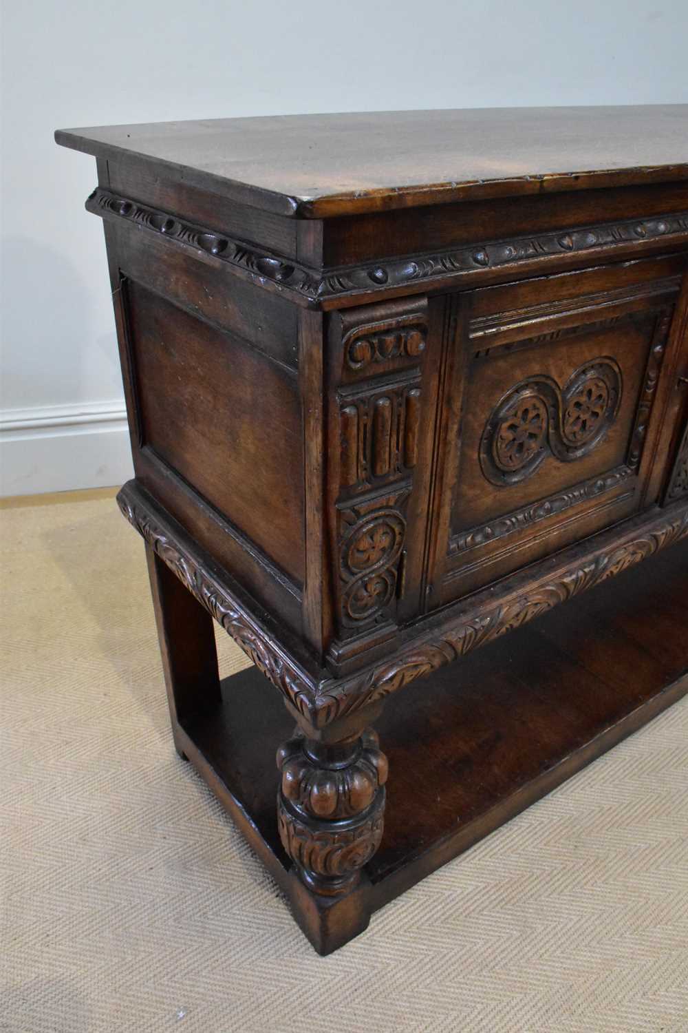 TITCHMARSH & GOODWIN; a reproduction carved oak dresser base with two drawers flanked by carved - Image 2 of 4