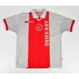 JOHANN CRUYFF; an Ajax retro style signed football shirt, signed to the reverse. Condition Report: