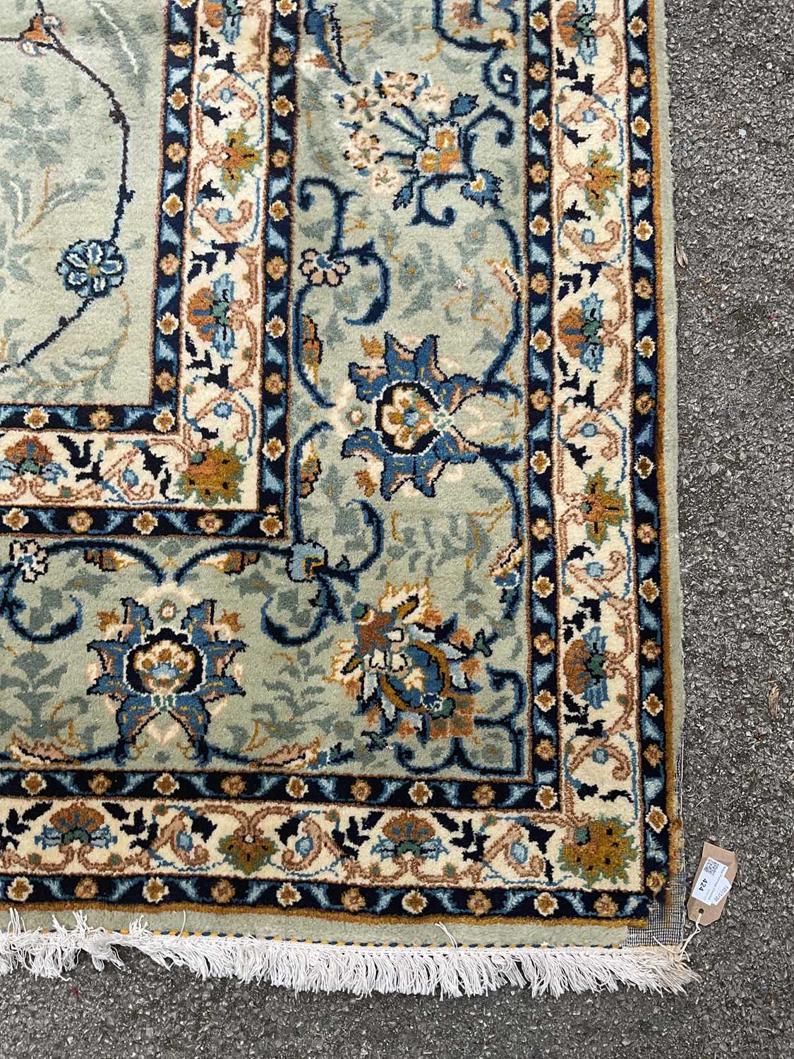 A pale blue wool carpet with floral pattern, 400 x 300cm. Condition Report: Worn corner and small - Image 4 of 8