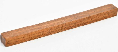A 19th century boxwood ruler with four slides for use in the brewery trade, length 30cm.