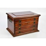 A Victorian mahogany coin/specimen chest with campaign style handles, and four drawers, on plinth