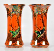 ROYAL STAFFORDSHIRE POTTERY, WILKINSON; a pair of Art Deco vases decorated with birds and floral