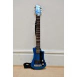 HOFNER; a six string 'Shorty' electric guitar, in blue, cased, together with a Rock Burn X-15G