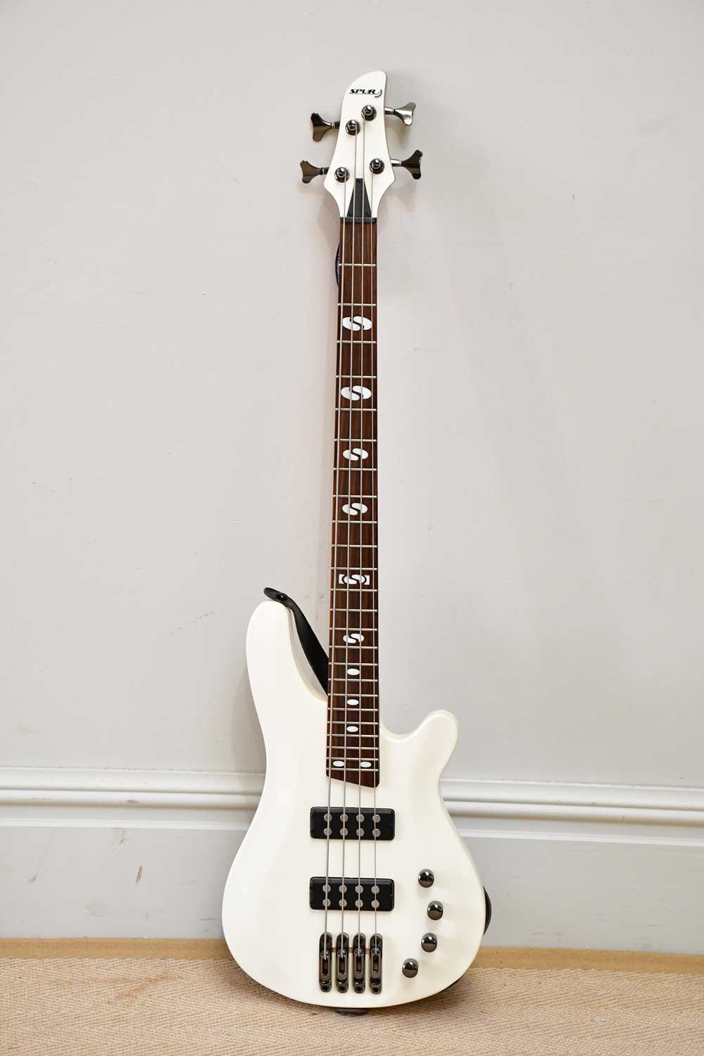 SPUR; a B-450 four string electric bass guitar.