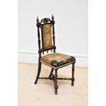 A Victorian rosewood hall chair with tapestry back and seat, height 95cm.