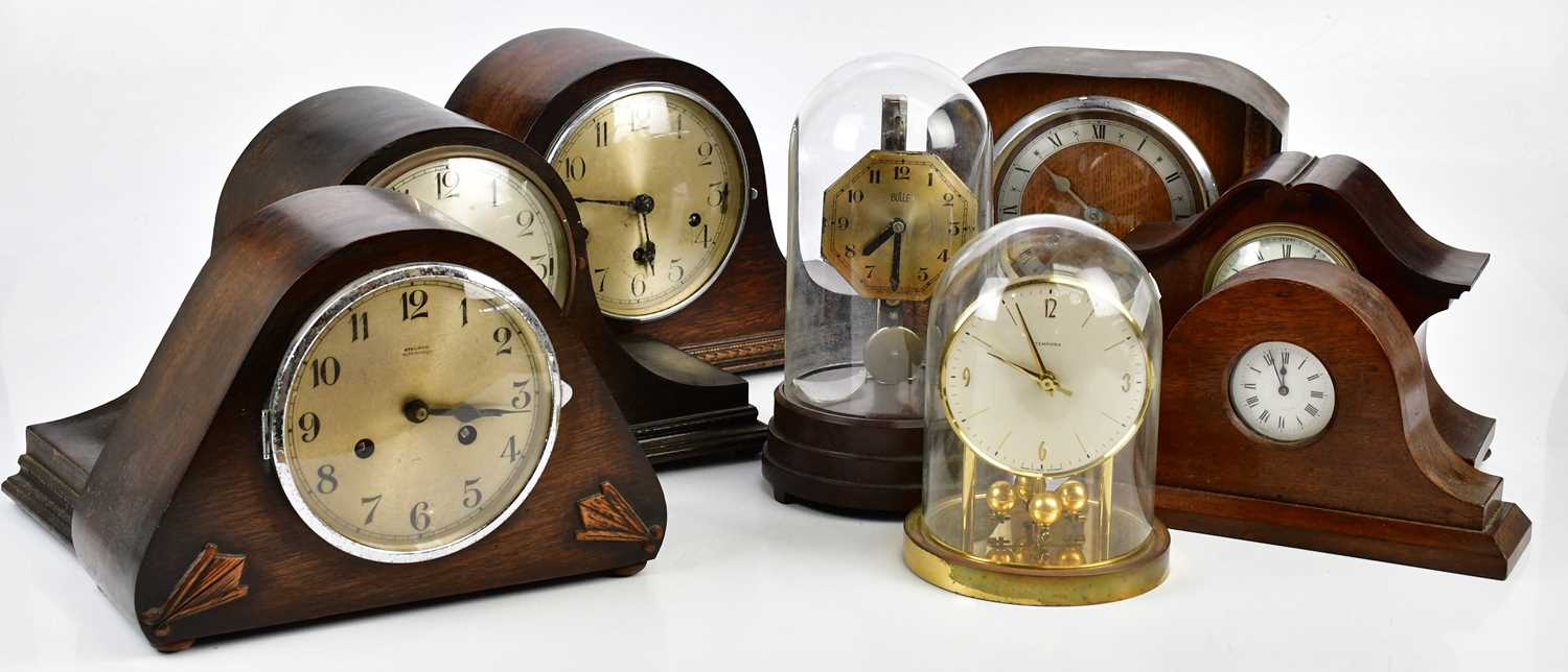 A collection of eight mantel clocks, to include a Boulle electric mantel clock with bakelite