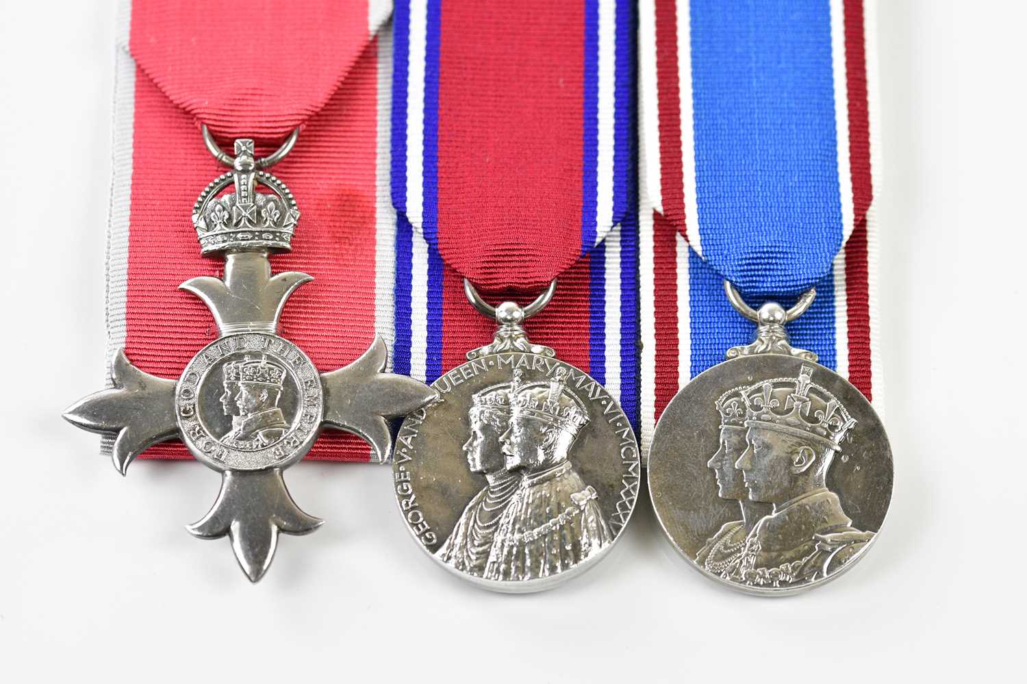 A group of three medals comprising Member of the Order of the British Empire, an MBE civil type