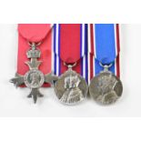 A group of three medals comprising Member of the Order of the British Empire, an MBE civil type