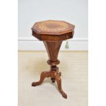 A Victorian walnut inlaid trumpet form sewing table, with fitted interior, height 70cm.