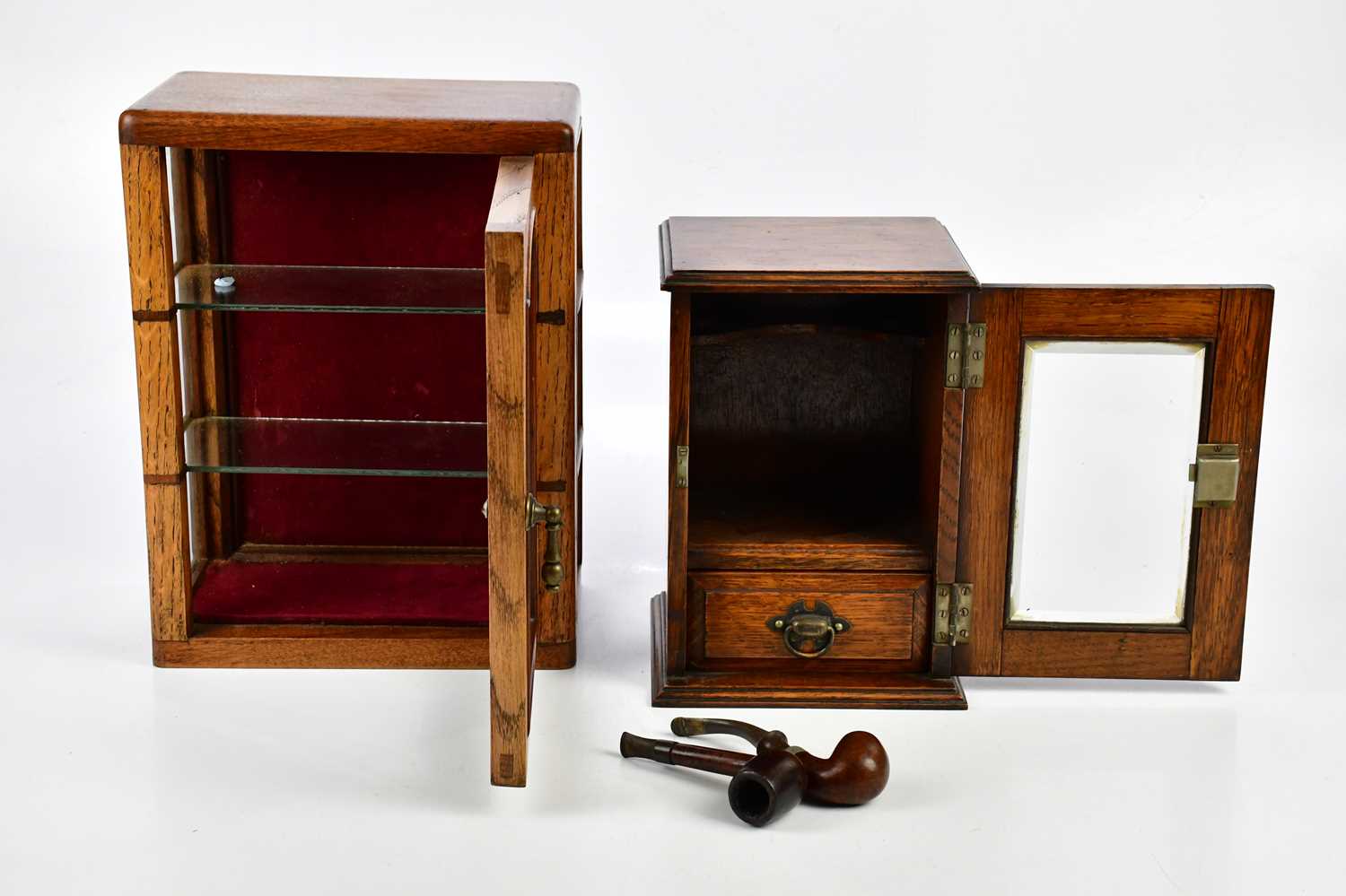 An early 20th century oak smoker's cabinet with single glazed door containing two pipes and an oak - Image 2 of 3
