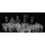 A collection of cut and other glassware, including a etched glass claret jug with silver plated