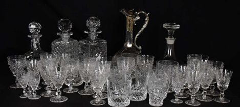 A collection of cut and other glassware, including a etched glass claret jug with silver plated