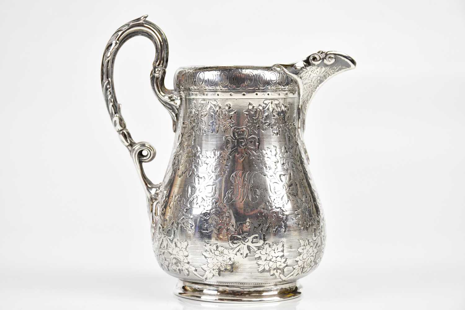EDWARD, EDWARD JR, JOHN & WILLIAM BARNARD; a Victorian hallmarked silver cream jug with chased