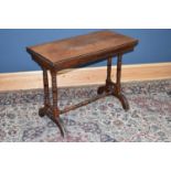 A late Victorian walnut card table with swivel fold-out top, height 73cm, depth 47cm, width 91cm.