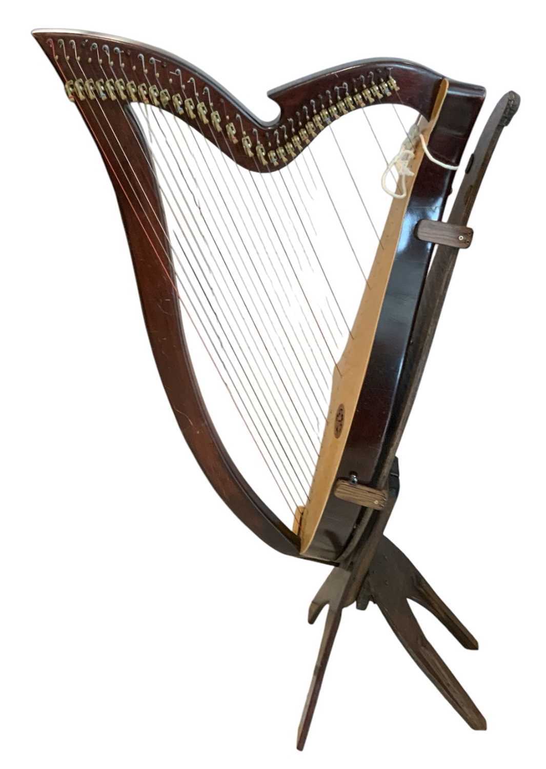 Standard VAT A modern Celtic thirty-three string non-pedal freestanding harp, height 143cm, width