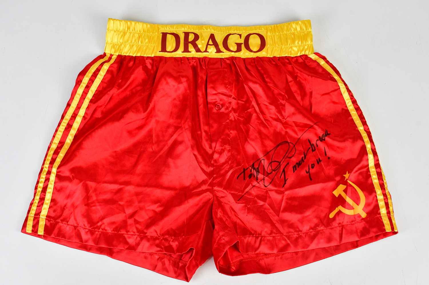 DOLPH LUNDGREN (IVAN DRAGO); a pair of signed replica shorts, inscribed 'I must break you'.