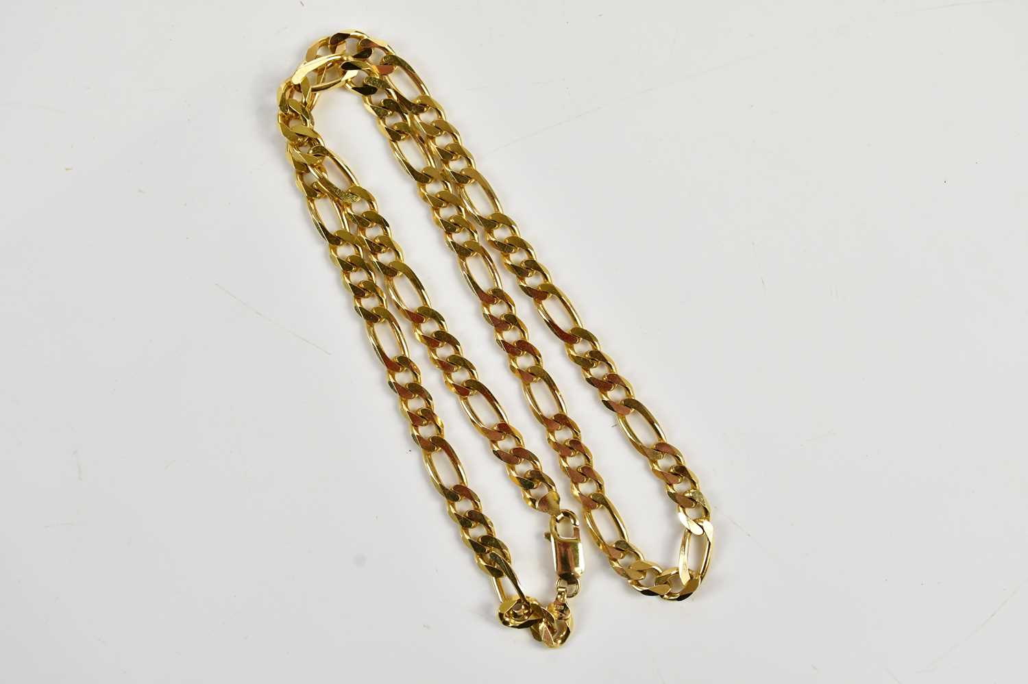 An Italian yellow metal curb link necklace, stamped 'Italy 375', approx weight 26.2g.