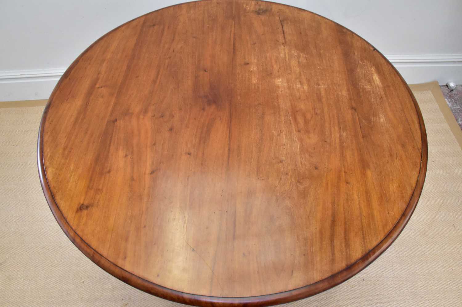 A Victorian mahogany tilt-top breakfast table on baluster and scrolling legs, diameter 114cm. - Image 2 of 3