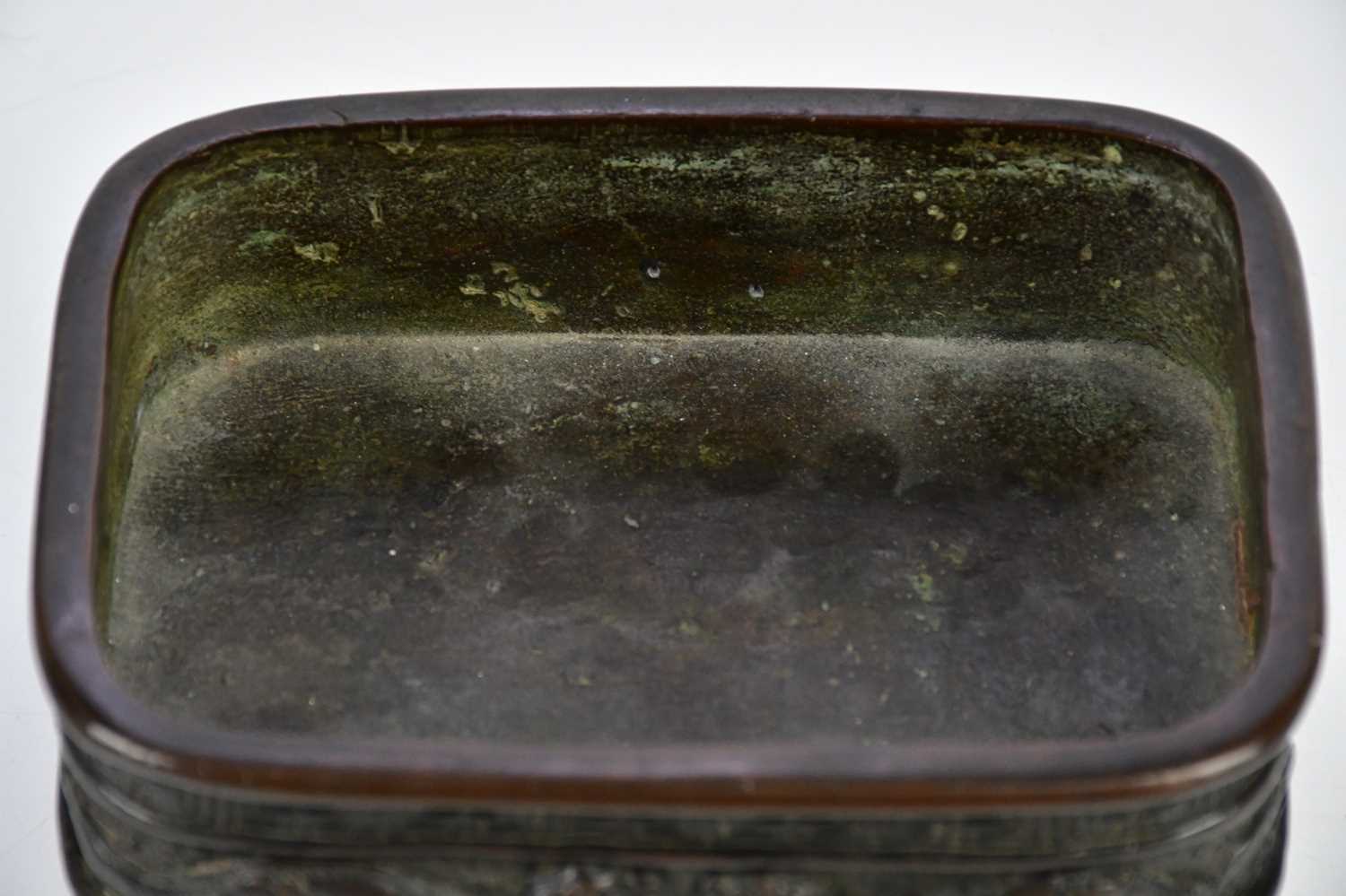 A late 19th century Japanese bronze bowl, with cast decoration of mythical beasts and Greek key - Image 5 of 7