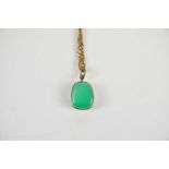 A chrysoprase pendant on a 9ct yellow gold chain, approx 6.4g.