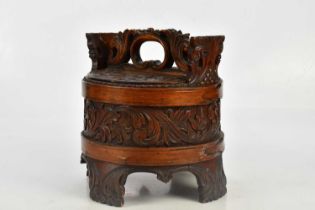 A Chinese carved wood wedding basket, height 29cm.