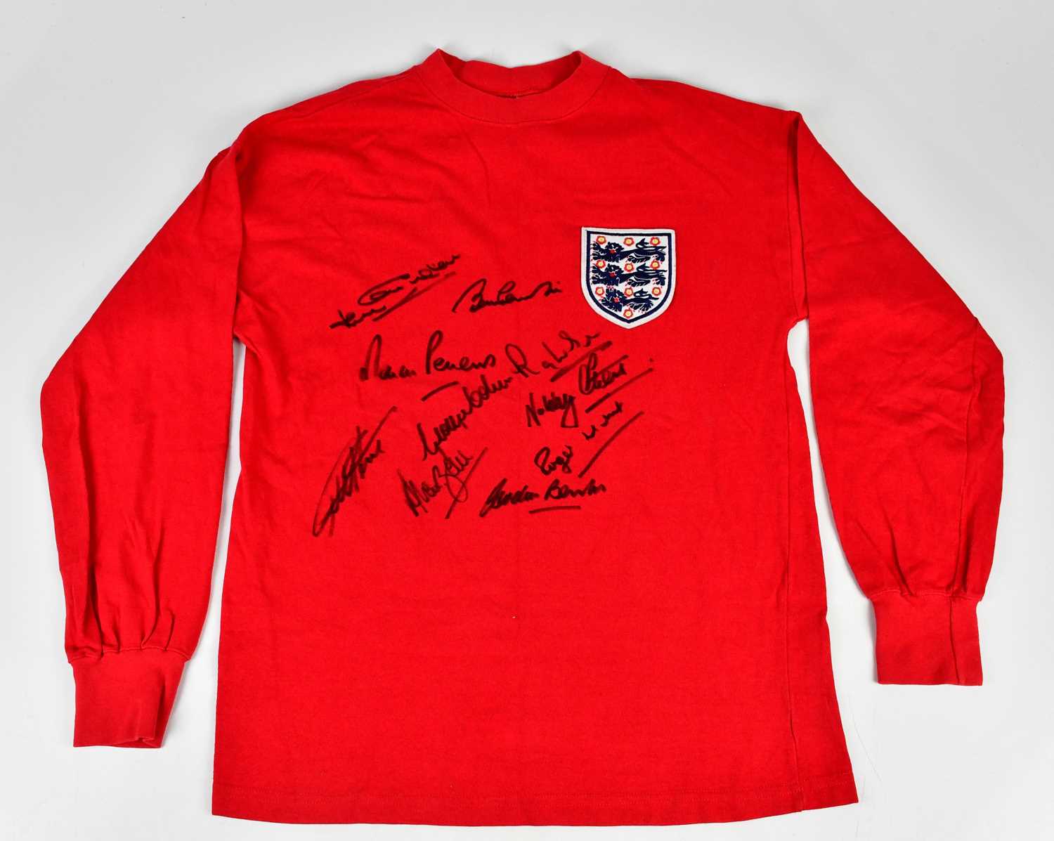 ENGLAND; a signed 1966 World Cup Winners retro style football shirt, signed to the front by Hurst,