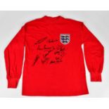 ENGLAND; a signed 1966 World Cup Winners retro style football shirt, signed to the front by Hurst,