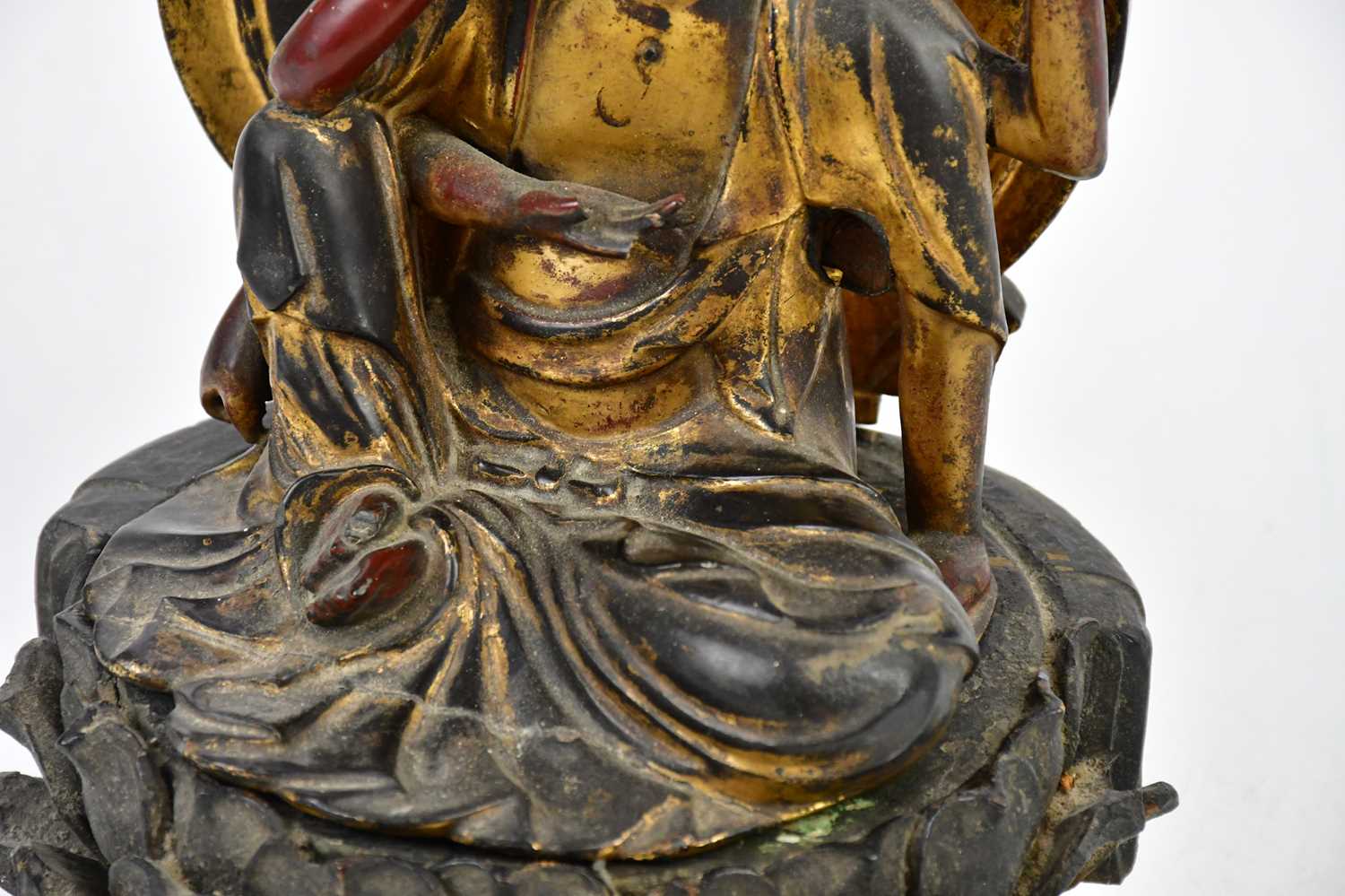 A 19th century carved gilt wood figure of Guanyin, with associated shaped back, on shaped floral - Image 3 of 4
