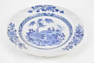 An 18th century Chinese Export blue and white plate, decorated with central scene of objects on a