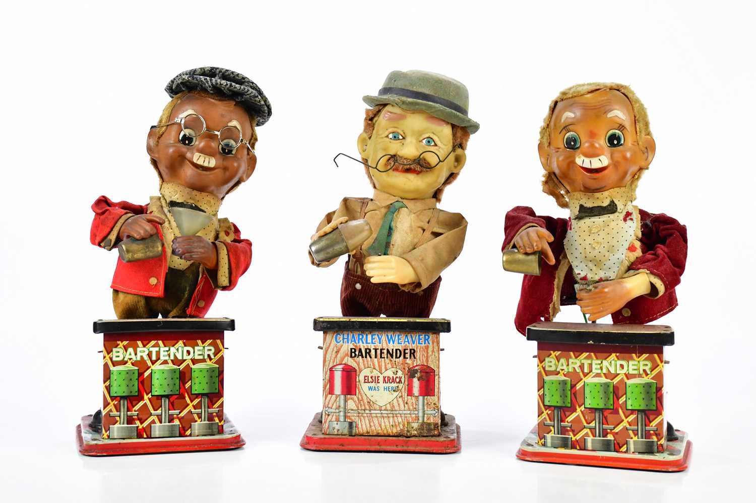 Three vintage tinplate battery operated bartenders including a Rosko example. Condition Report: We