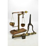 A vintage brass scales, on oak plinth, the scales initialled 'S&P Ltd' and numbered 338, overall