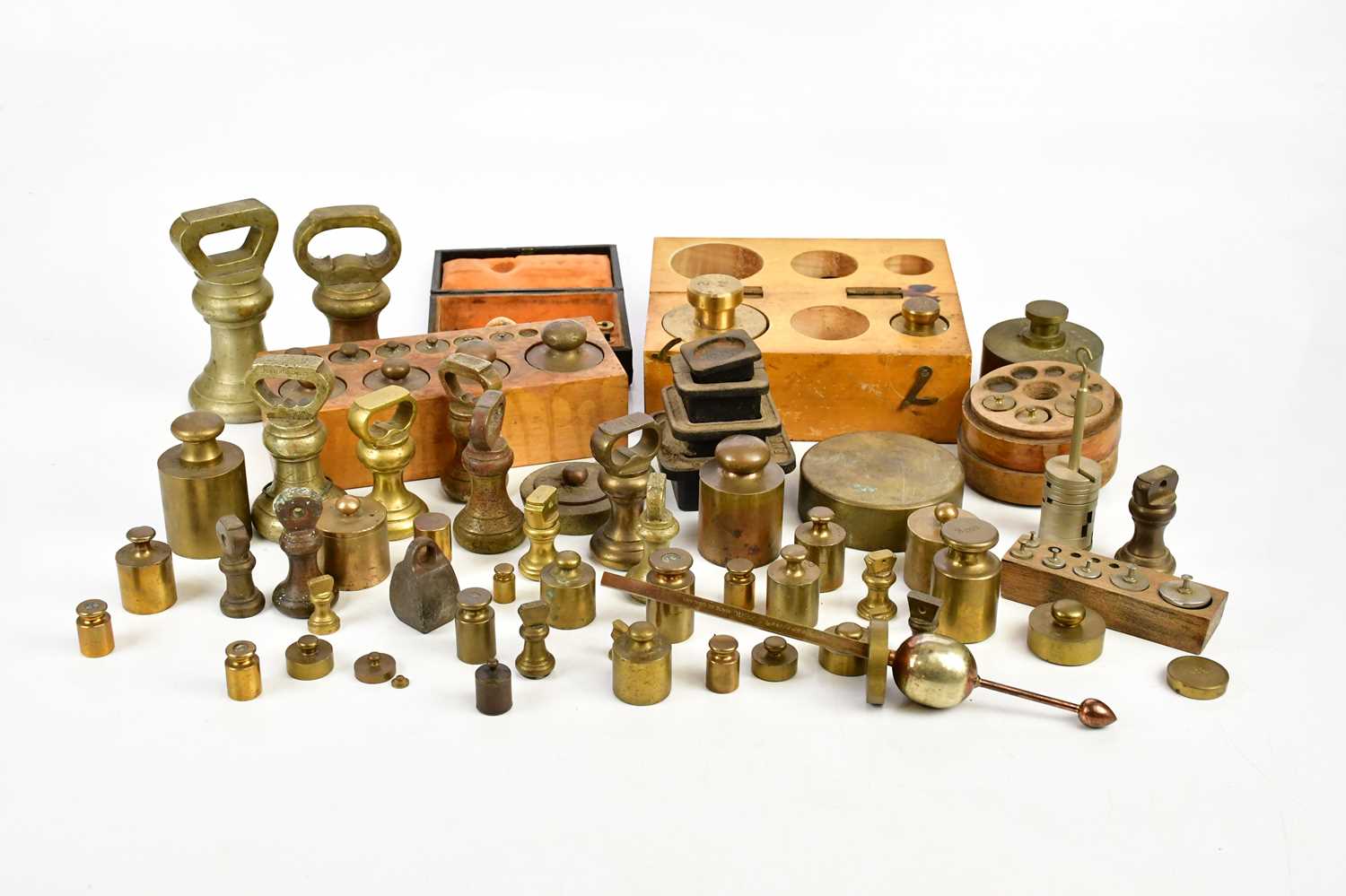 A collection of brass, iron and metal weights, various makers and styles (qty).