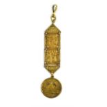 A 1920s Art Deco Egyptian Revival watch fob, 14.5cm, cased.