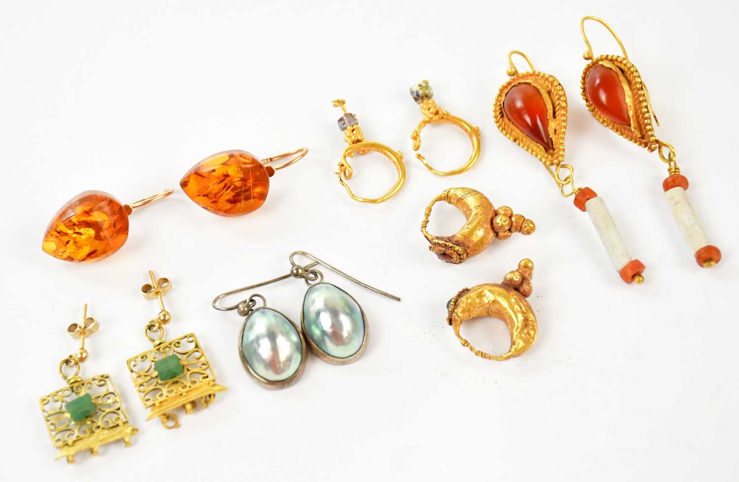 A pair of 9ct yellow gold amber earrings, together with four further pairs of yellow metal earrings,