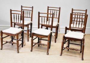 A near set of six 19th century beech and ash country kitchen dining chairs, with spindle backs,