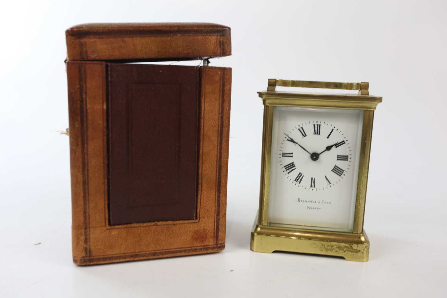 BRAMWELL & SONS; a French brass carriage timepiece, height with handle down 11.5cm, with leather - Image 5 of 5
