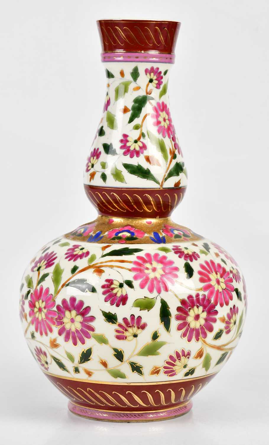 IN THE MANNER OF FISCHER BUDAPEST/ZSOLNAY PECS; a double gourd vase with floral decoration,