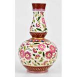 IN THE MANNER OF FISCHER BUDAPEST/ZSOLNAY PECS; a double gourd vase with floral decoration,