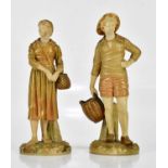 ROYAL WORCESTER; a pair of gilded blush ivory figures, a Dutch boy and girl holding baskets, factory