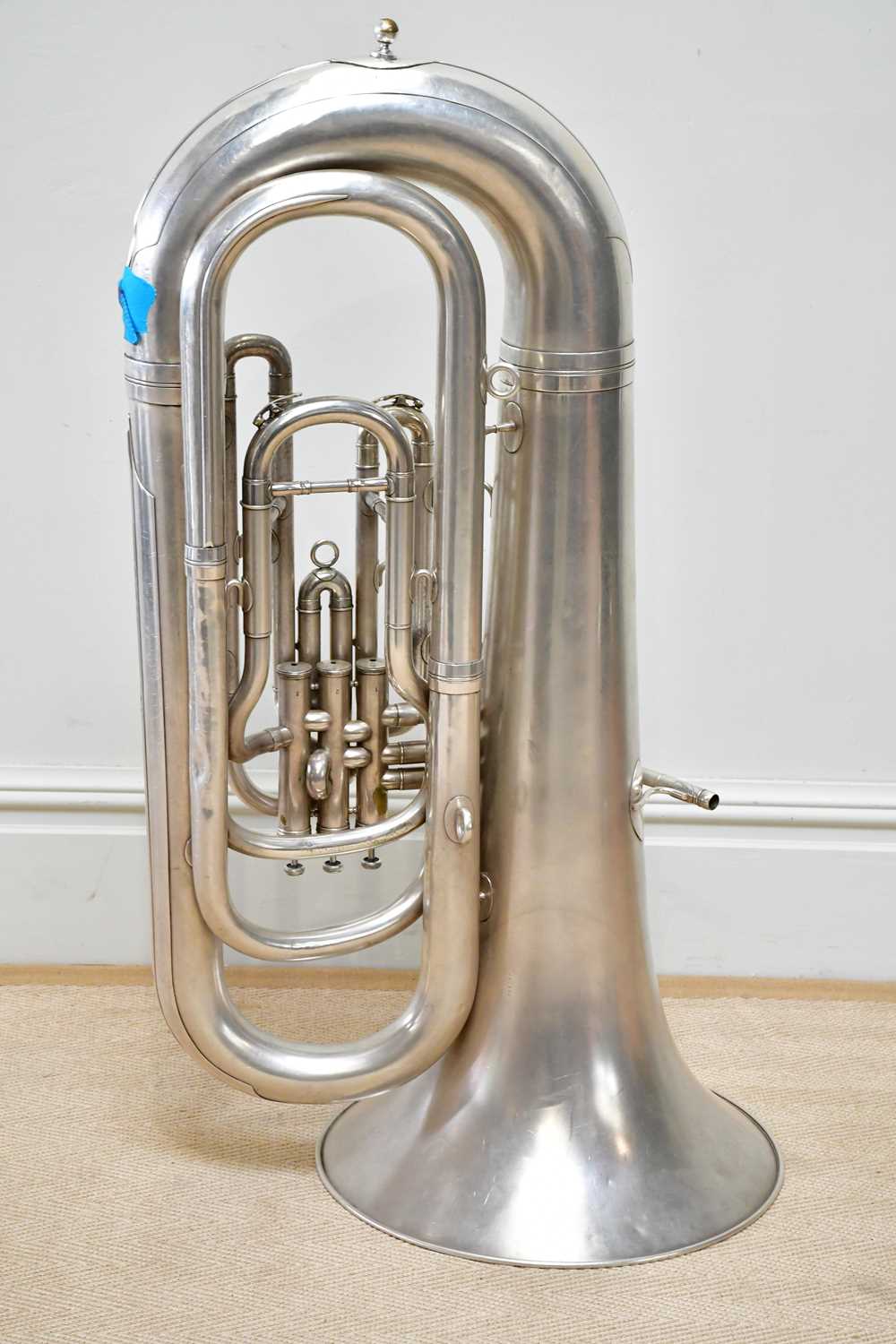 BOOSEY & HAWKES; an Imperial tuba, numbered 584759, with two mouth pieces, stand and accessories. - Image 6 of 9