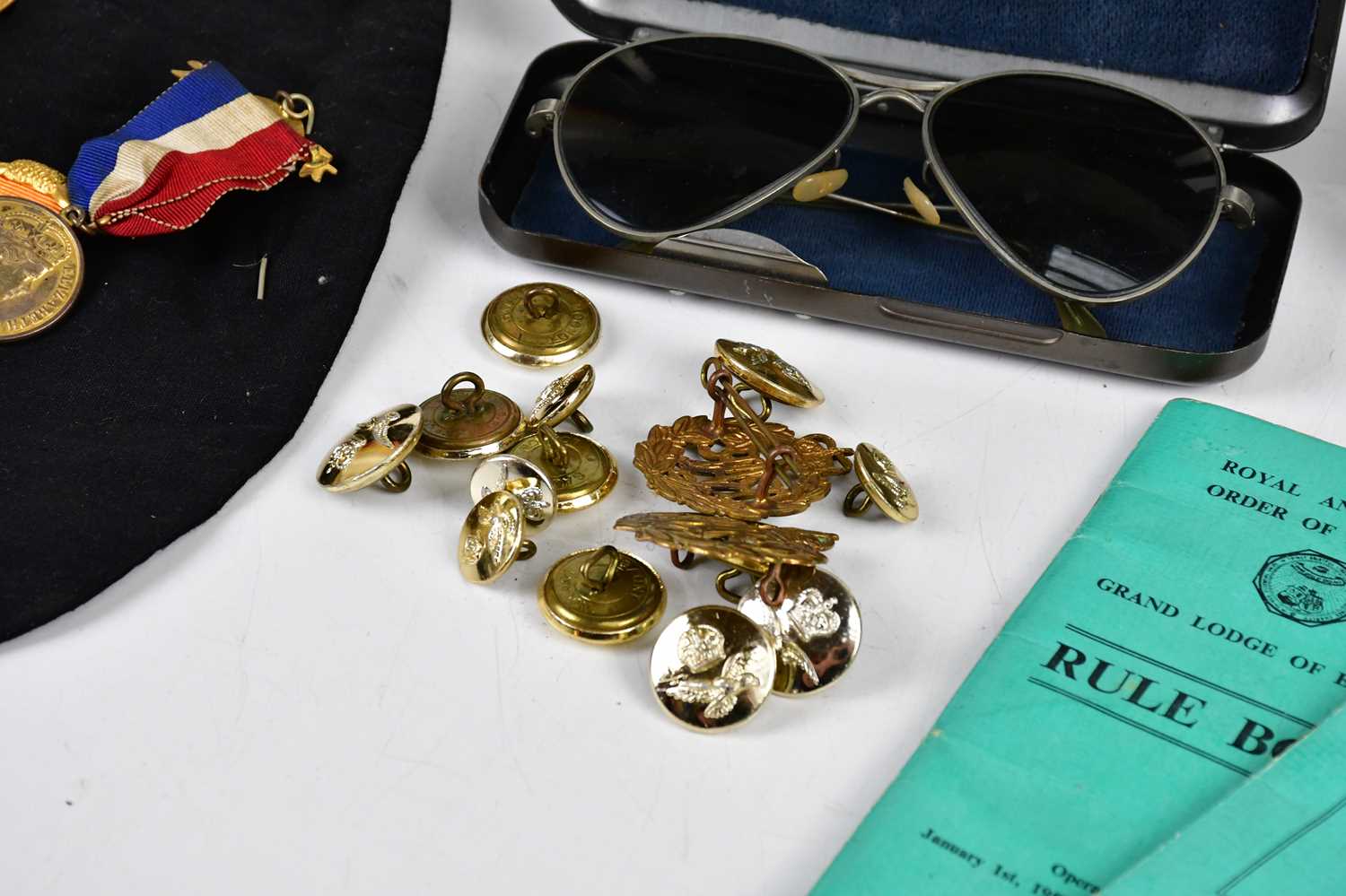 A collection of assorted Buffalo medals, military cap badges including RAF, British military glasses - Image 3 of 4