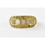 A Victorian 18ct yellow gold seed pearl set dress ring, size M, approx weight 4.4g.